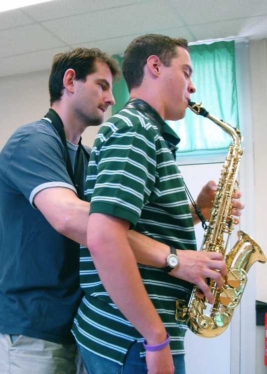 French saxophonist Damien Royannais giving a lesson to Timothy Rosenberg at the 2004 Université Européenne de Saxophone in Gap, France. Note: Timothy does not use this particular technique to teach air support. The French are very friendly.